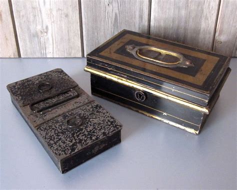 antique metal cash box|old leather conichal money box.